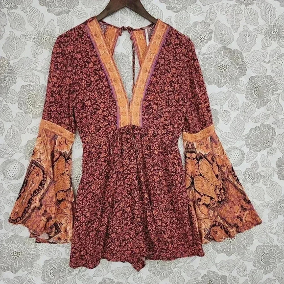 Free People Pants - Free People Printed Flare sleeve keyhole Romper Size S 8314